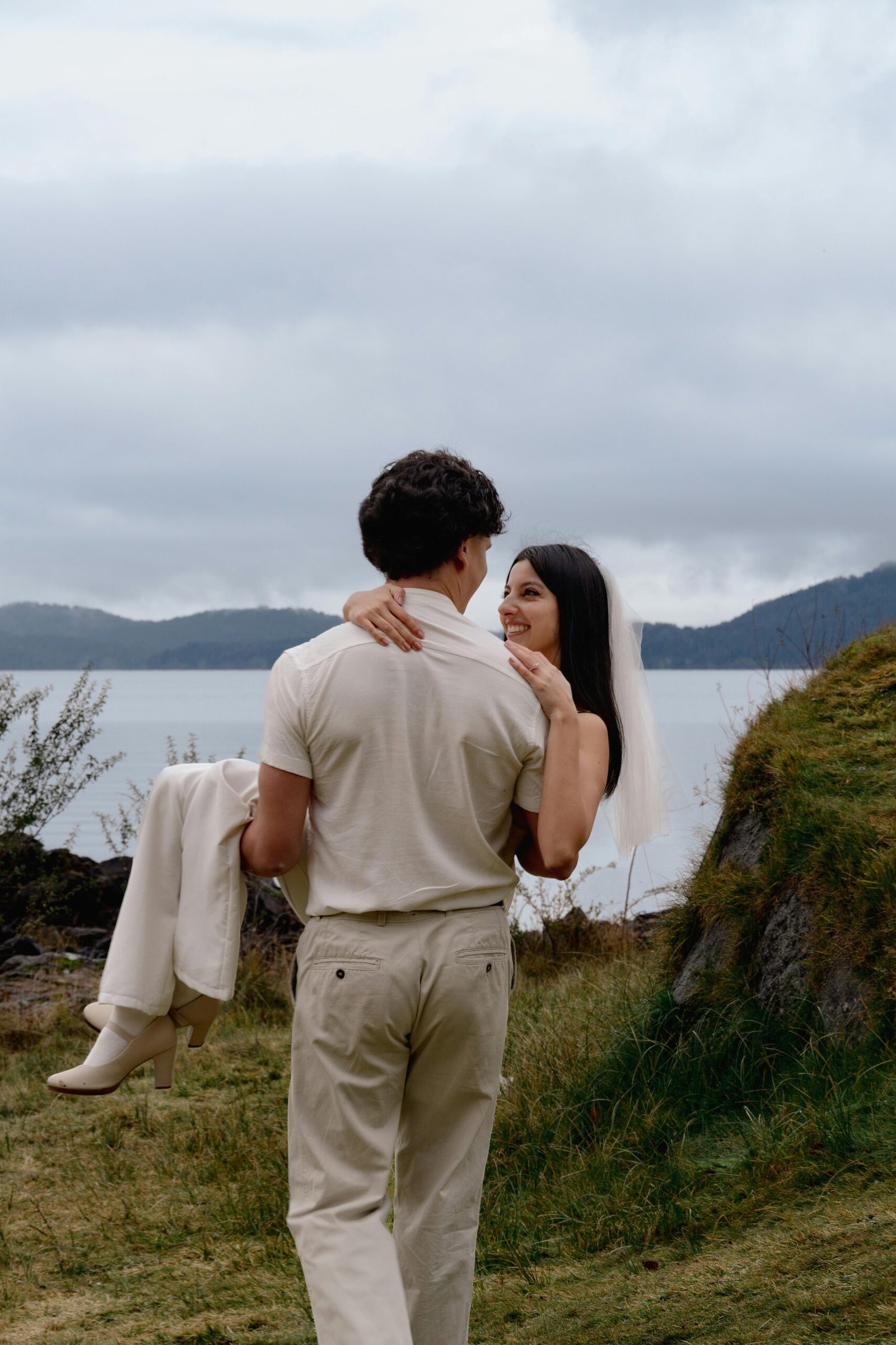 Romantic image of a wedding couple in San Carlos de Bariloche, Argentina by the lake.